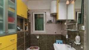 Apartments by the sea Omis - 13727