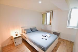 Appartements T2 Grand Espace calme et confort : photos des chambres