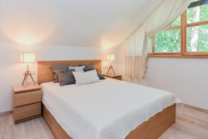 Sengirės kotedžai Juodkrantė