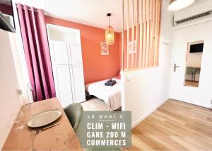 Appartements LE QUAI 3 - Studio neuf LUMINEUX CALME - CLIM - WiFi - Gare a 200m : photos des chambres