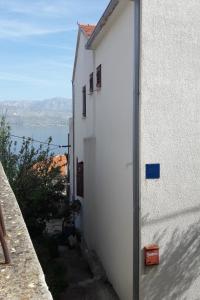 Apartments by the sea Postira, Brac - 15148