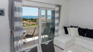 Two-Bedroom Apartment with Balcony and Sea View room in Apartments with a parking space Seget Vranjica Trogir - 12476