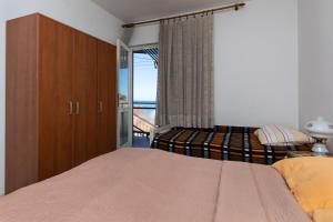 Apartments by the sea Sumpetar, Omis - 9435