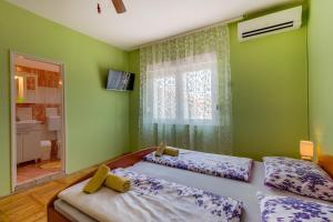 Rooms with a parking space Mali Losinj (Losinj) - 9681