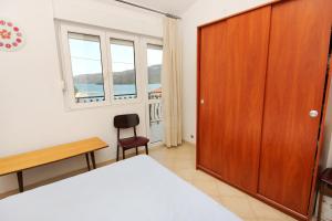 Apartments by the sea Marina, Trogir - 10003