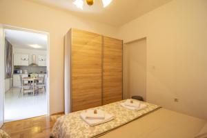 Apartments with a swimming pool Gustirna, Trogir - 11703