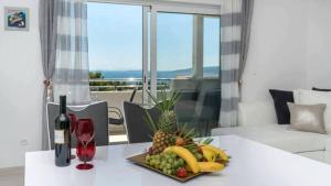 Family friendly apartments with a swimming pool Seget Vranjica, Trogir - 12476