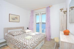 Two-Bedroom Apartment with Terrace and Sea View room in Apartments by the sea Rogoznica - 13012