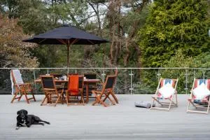 Tree Top House - Three Legged Cross