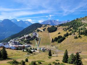 Appartements Les Iris T2 station Alpe Huez : photos des chambres