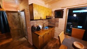 Cabana Himalaya Lodge cu ciubăr din inima munților Apuseni- masivul Buces -Vulcan