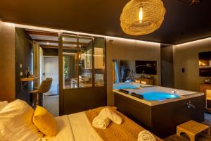 Appartements La Suite - Spa & Sauna : photos des chambres