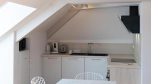 Appartements Le Grenier Cosy, T2 classe meuble de tourisme : photos des chambres