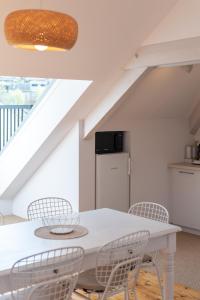 Appartements Le Grenier Cosy, T2 classe meuble de tourisme : photos des chambres