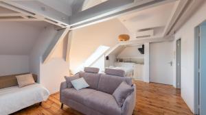 Appartements Le Grenier Cosy, T2 classe meuble de tourisme : photos des chambres