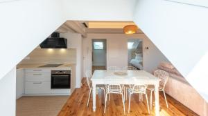 Appartements Le Grenier Cosy, T2 classe meuble de tourisme : photos des chambres