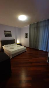 Queen Room with Shared Bathroom