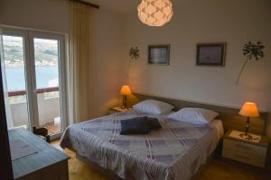 Two-Bedroom Apartment with Balcony and Sea View room in Apartments by the sea Pag - 532