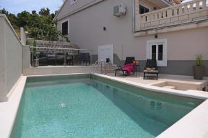 Seaside apartments with a swimming pool Tri Zala, Korcula - 558