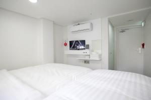 Phòng Hai Giường Đơn Loại Sang (Deluxe Twin Room)