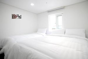 Phòng Hai Giường Đơn Loại Sang (Deluxe Twin Room)