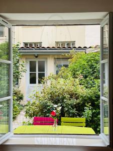 Appartements Le Jardin croix Roussien : photos des chambres