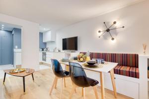 Appartements Le Roi Soleil T2 en plein coeur De Ville ! : photos des chambres