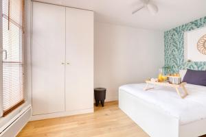 Appartements Le Roi Soleil T2 en plein coeur De Ville ! : photos des chambres