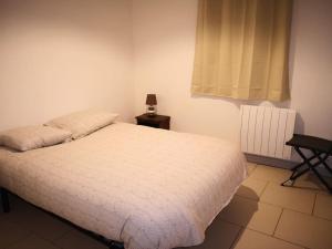 Appartements L'ecurie : photos des chambres