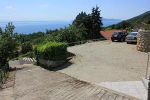 Apartments with a parking space Lovran Opatija 2357