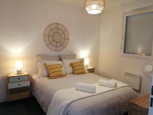 Appartements Le cocon de Marie,piscine, balcon, parking gratuit, baignoire : photos des chambres