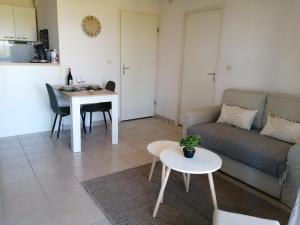 Appartements Le cocon de Marie,piscine, balcon, parking gratuit, baignoire : photos des chambres