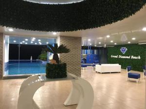 Grand Diamond Beach lujoso departamento frente al mar