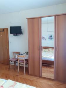 Apartments and rooms by the sea Kampor, Rab - 12473