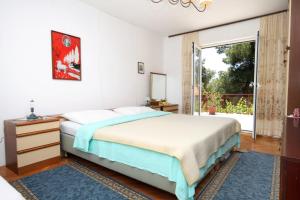 Two-Bedroom Apartment with Terrace and Sea View room in Apartments by the sea Mali Losinj (Losinj) - 2493