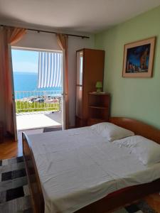Two-Bedroom Apartment with Terrace and Sea View room in Apartments and rooms by the sea Podgora Makarska - 2616