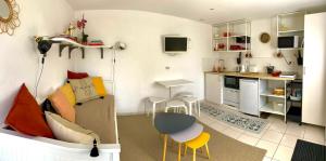 Maisons de vacances Studio dans une longere de charme pres de la plage : photos des chambres