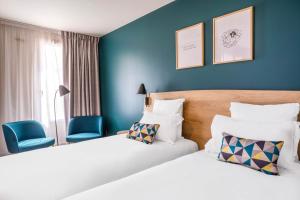 Appart'hotels Appart'City Confort St Quentin en Yvelines - Bois D'Arcy : photos des chambres