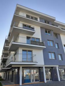 Apartament Kapitański Mostek 17A z widokiem na port i latarnię morską oraz garażem