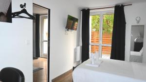 Appartements Class&Indus Appt 10mn Aeroport Roissy CDG : photos des chambres