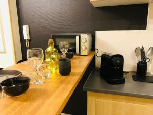 APPART IN PY - Charmant Studio RDC plein centre