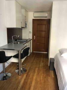 Appartements Studio2 hyper-centre climatise : photos des chambres