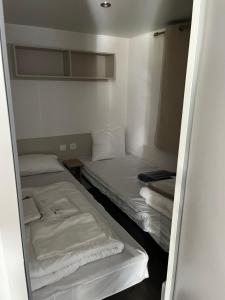 Campings Location mobil home saison 2023 : photos des chambres