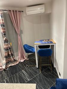 Appartements APPARTEMENT AVEC VUE SUR LA TOUR EIIFEL : photos des chambres