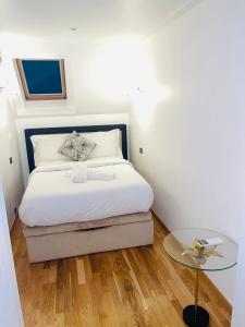 Appartements APPARTEMENT AVEC VUE SUR LA TOUR EIIFEL : photos des chambres