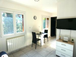 Appartements Le Petit Randonneur - Studio - WIFI - Mont-Saxonnex : photos des chambres