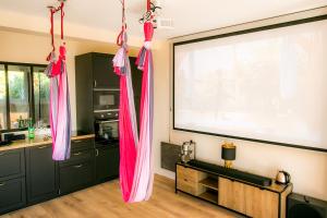 Appartements Le Boudoir de Fanny - Sauna/Balneo/cine/Hamacs : photos des chambres