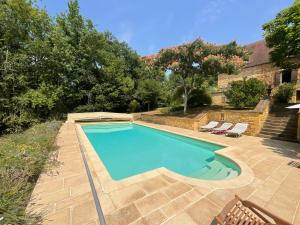 Maisons de vacances Belle demeure perigourdine avec piscine : photos des chambres