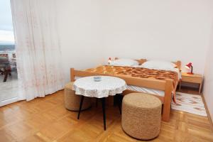 Three-Bedroom Apartment with Terrace and Sea View room in Apartments by the sea Vantacici Krk - 5347