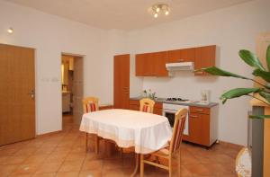 Apartments by the sea Senj - 5570